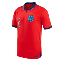 Camisa de Futebol Inglaterra Harry Maguire #6 Equipamento Secundário Mundo 2022 Manga Curta